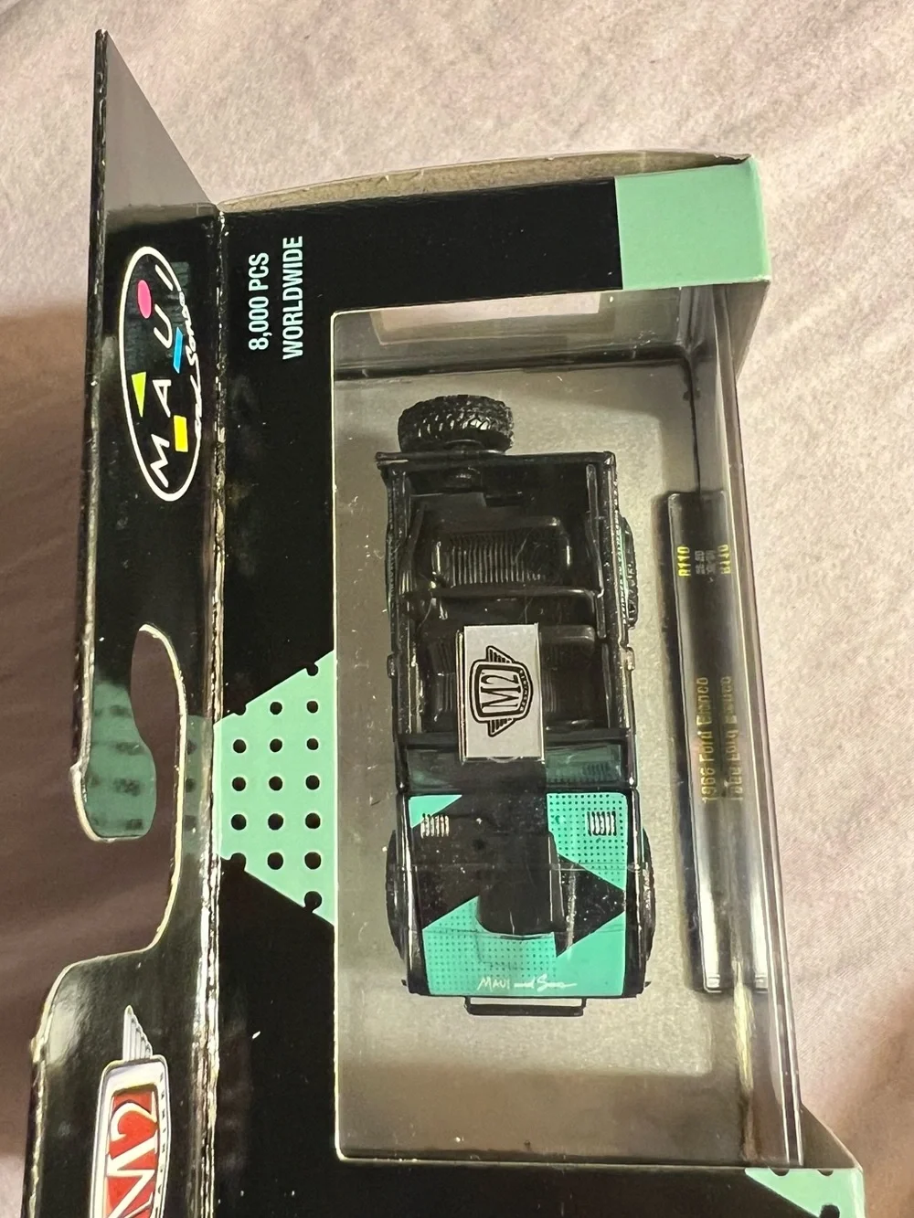 Maui and Sons Black and Mint Green 1966 Ford Bronco Die-Cast